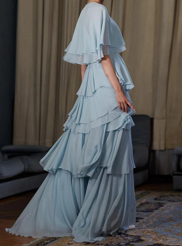 Girlhomeshops - Robe longue de bal bleue style cape à volants en mousseline fluide GH5753