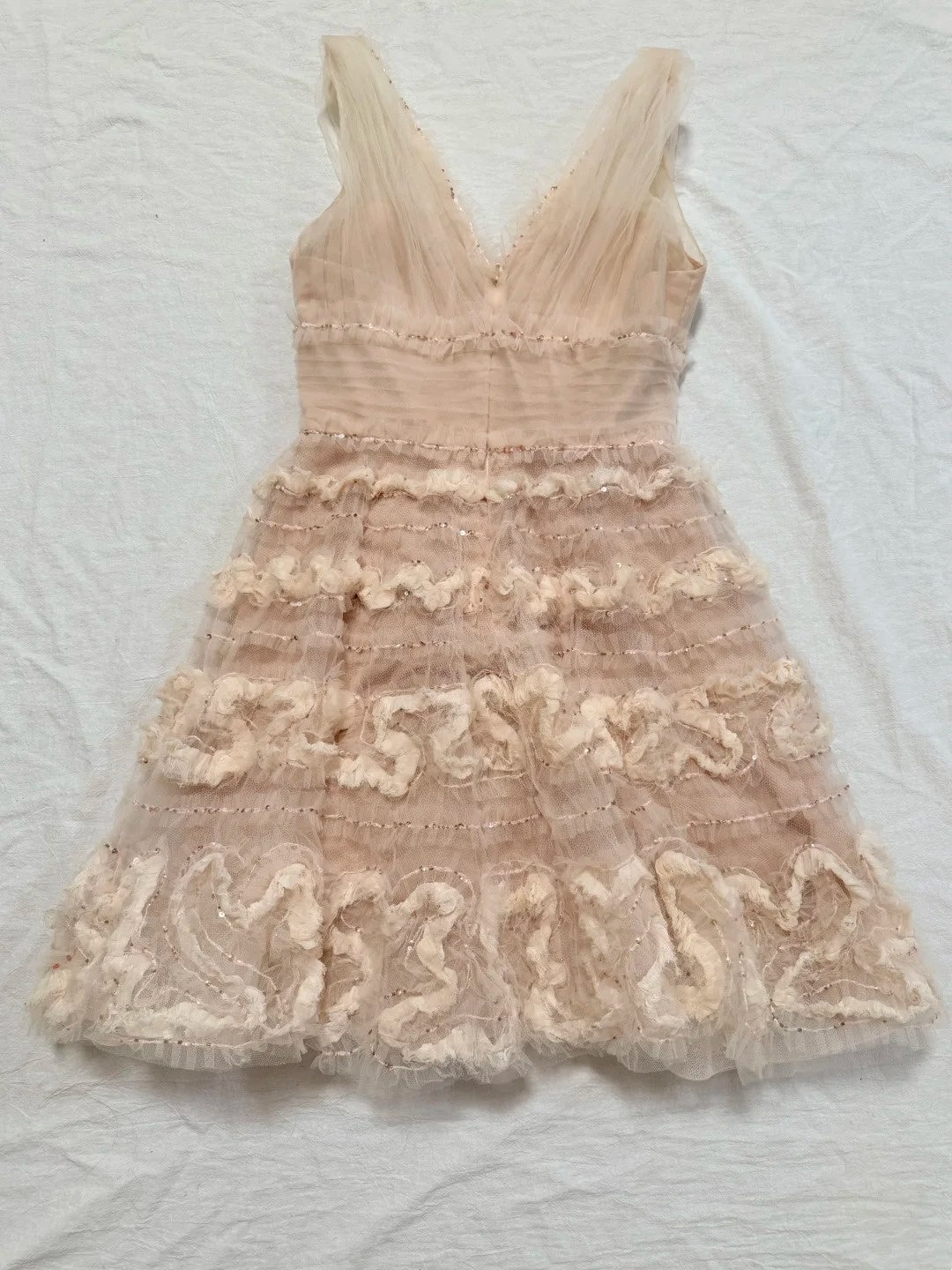 girlhomeshops - Robe midi sans manches en tulle rose nude avec sequins et motifs texturés 3D gh6312