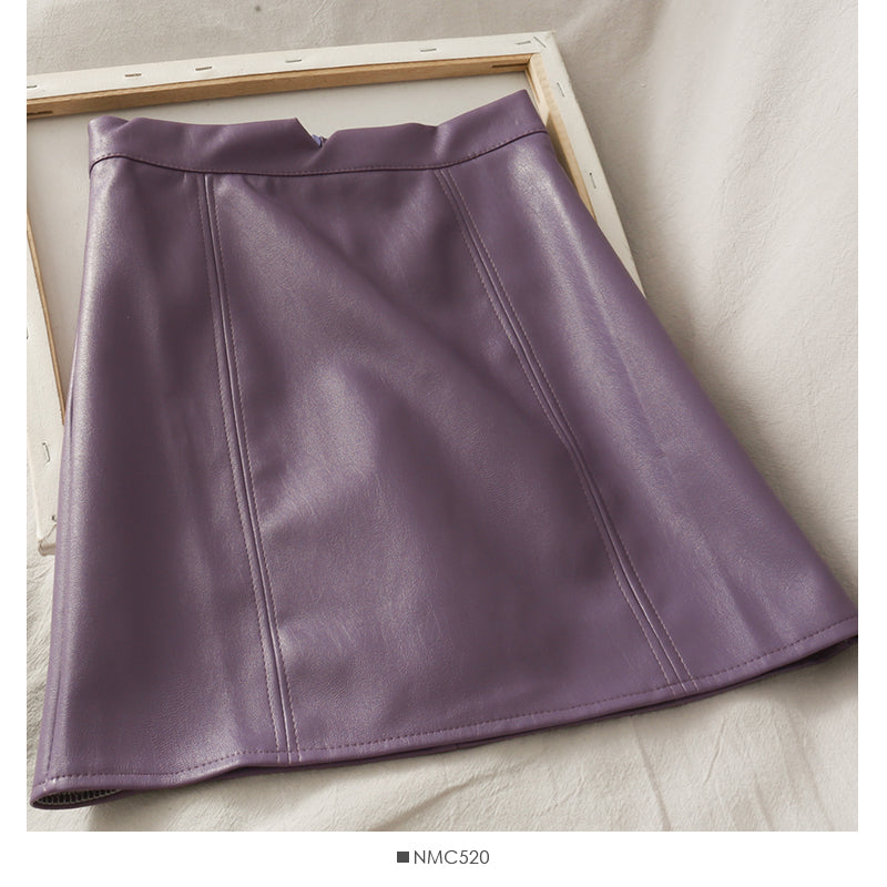 Retro and versatile solid color high waist thin A-shaped small leather skirt 2542