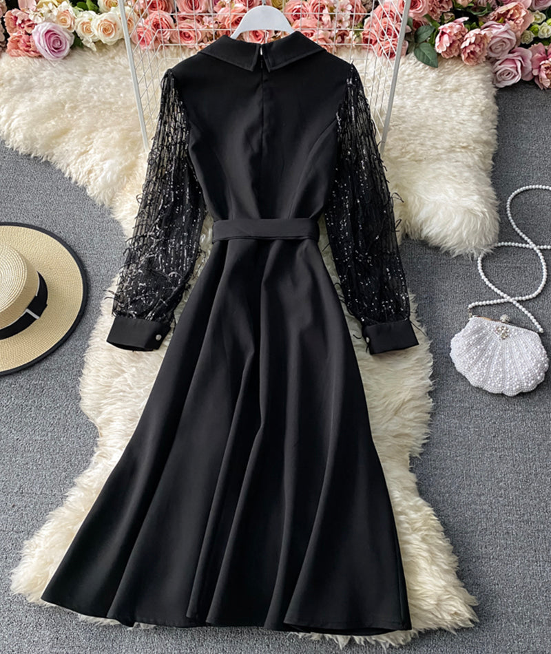 Robe noire à manches longues et col en V avec sequins 958