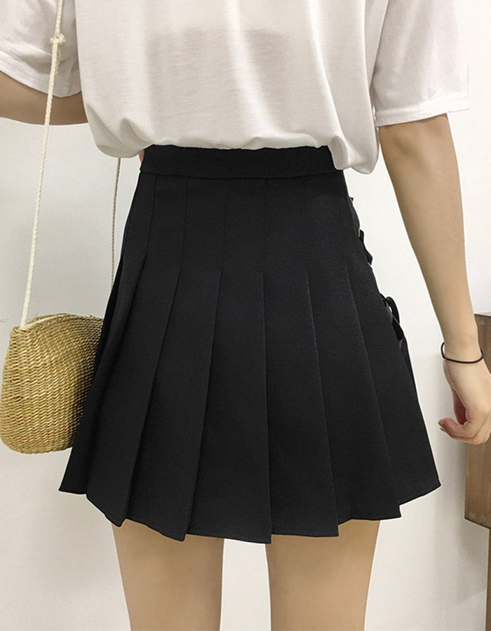 Jupe plissée mignonne à nœud latéral en coupe A 3499