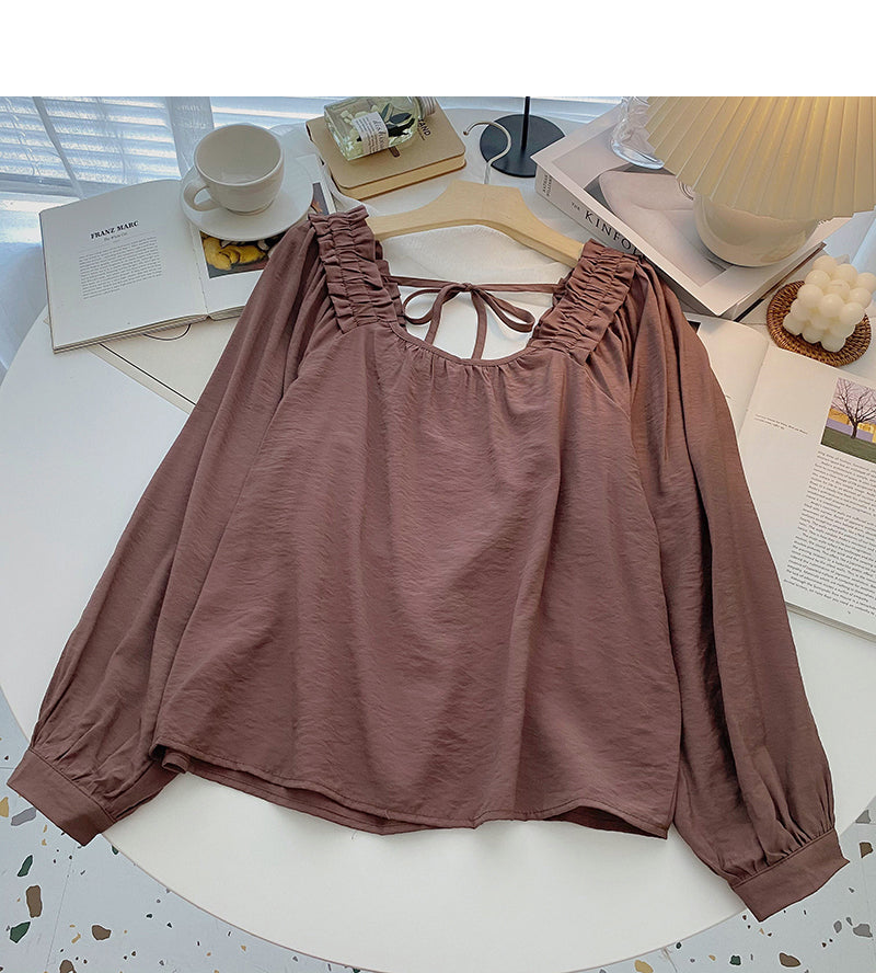 Haut ample à manches longues et fines à col carré et à petit design 6317