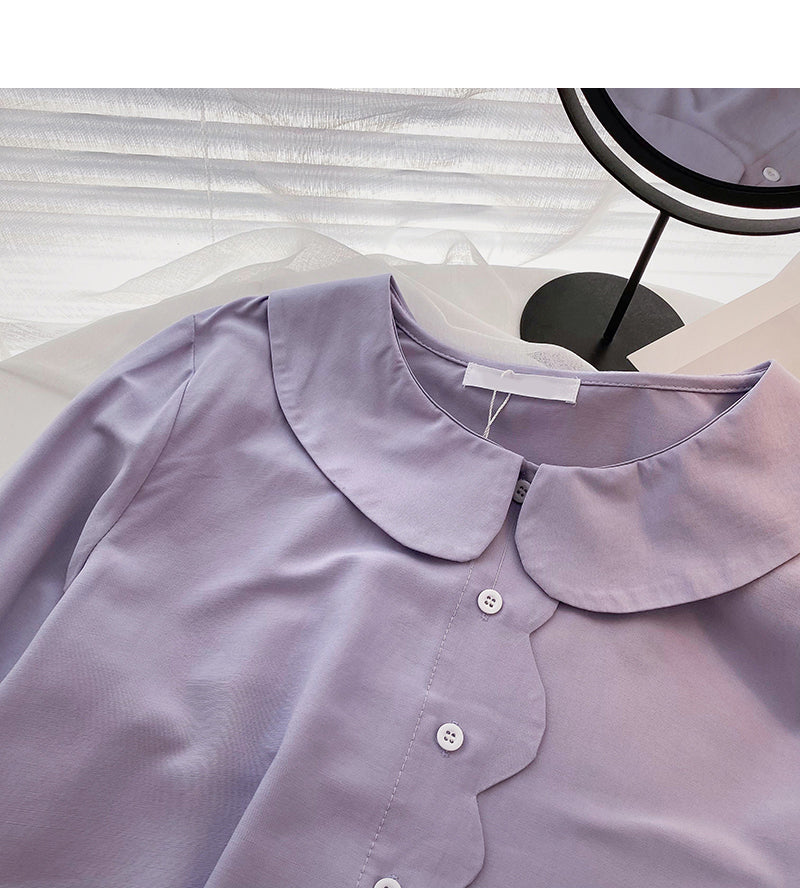 Le design à bords ondulés présente un haut à col fin pour bébé 6294