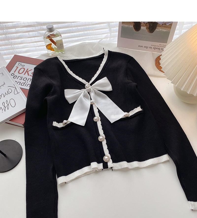 Korean version of exotic sweet long sleeved pearl button blouse 6441