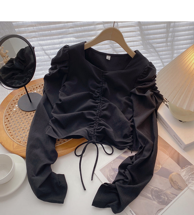 La chemise à manches longues plissée avec cordon de serrage montre un haut de tempérament mince 6421