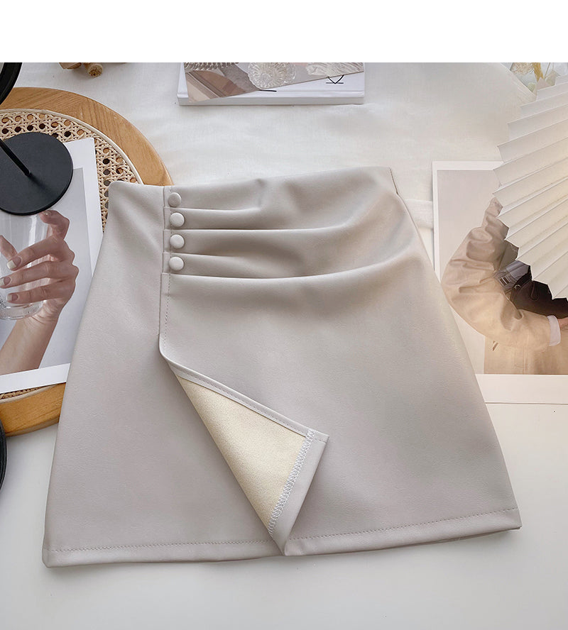 Solid color pleated PU leather short skirt for women is thin and versatile 5587