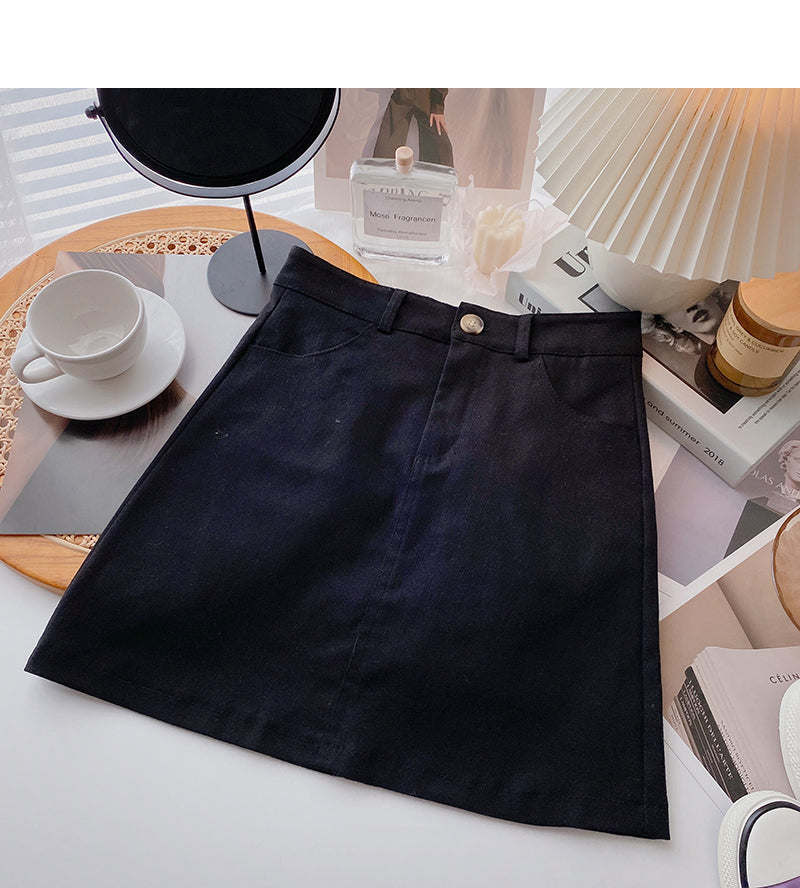 Nouvelle version coréenne de la jupe courte simple et décontractée de couleur unie tendance 5659