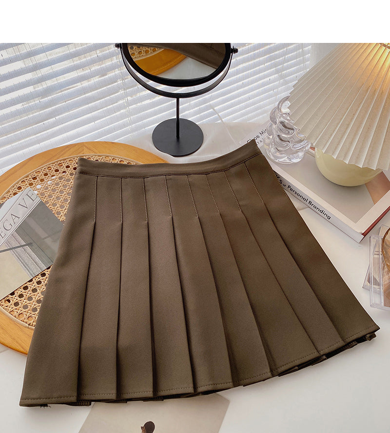 Pleated skirt is a popular solid color high waist A-line skirt 5357