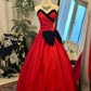 Robe de bal bandeau rouge et noire à blocs de couleurs : nœud 3D, robe évasée cintrée à la taille, robe maxi rétro pour banquet, modèle gh6581
