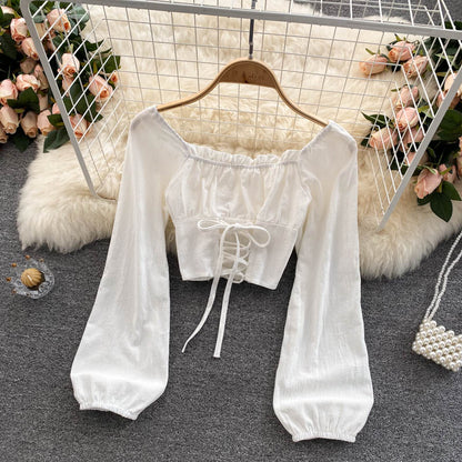 Cute long sleeve lace up tops 270