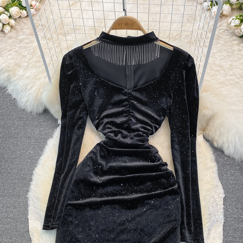 Robe portefeuille à col en V et à pampilles de tempérament de célébrité 3391