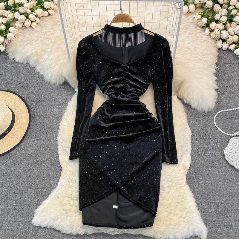 Robe portefeuille à col en V et à pampilles de tempérament de célébrité 3391