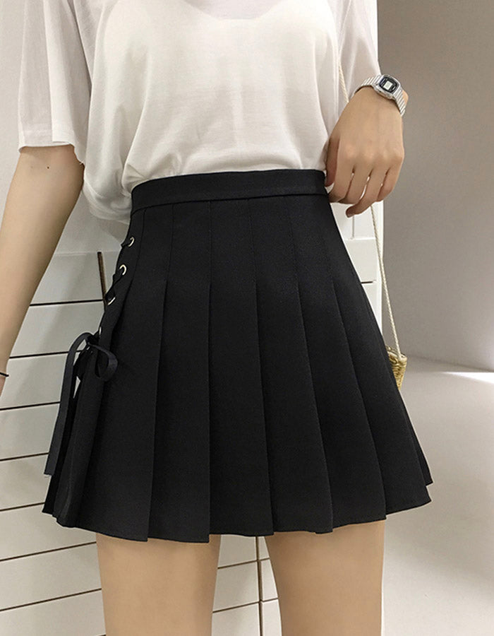 Jupe plissée mignonne à nœud latéral en coupe A 3499