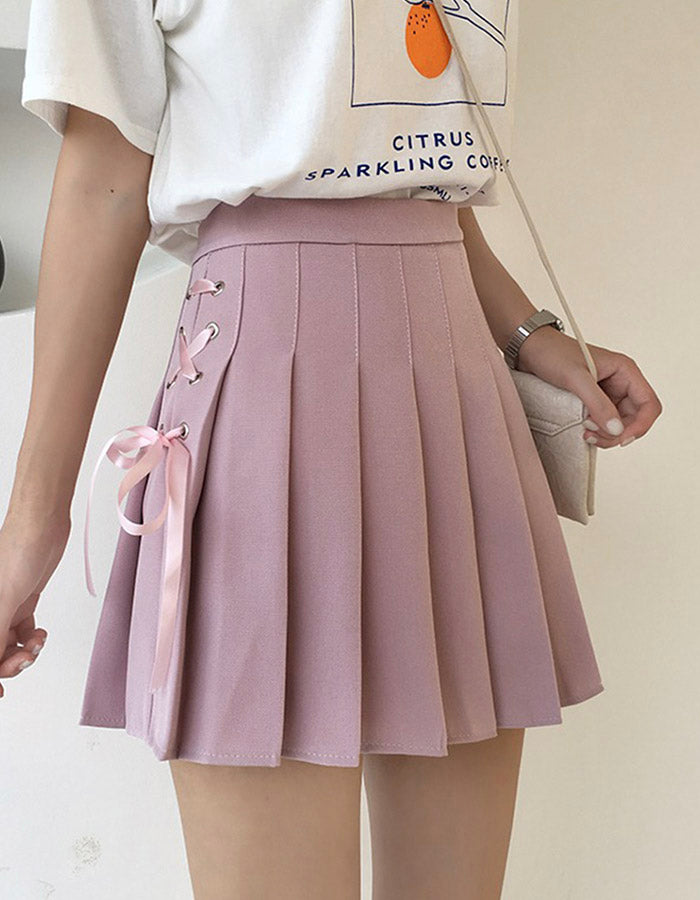 Jupe plissée mignonne à nœud latéral en coupe A 3499