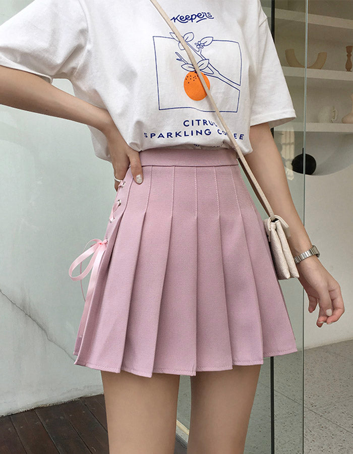 Jupe plissée mignonne à nœud latéral en coupe A 3499