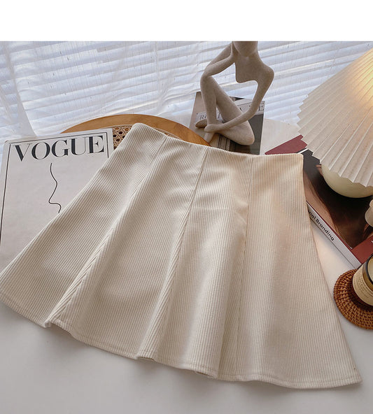 Foreign style leisure solid color high waist A-line umbrella skirt short skirt  5575