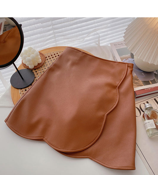 The new Korean design feels irregular and slim fashion PU leather skirt  5528