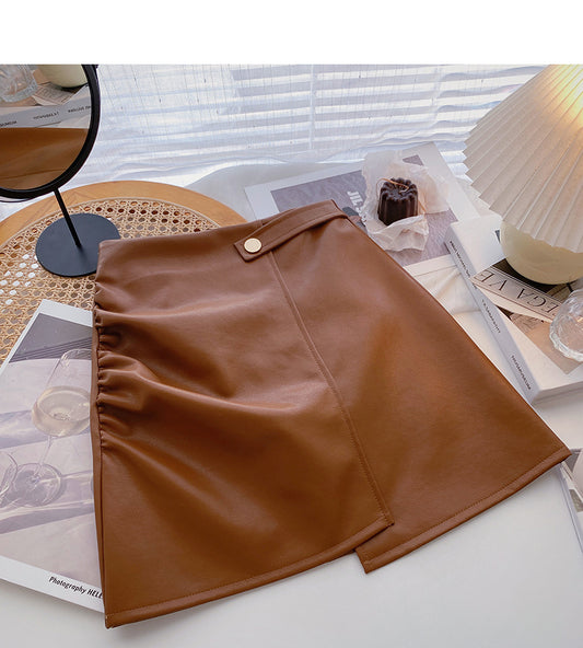Korean wrinkled Hip Wrap irregular thin high waist A-shaped PU leather skirt  5591
