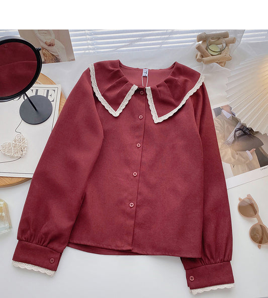 Version coréenne du haut polyvalent à manches longues et à col de poupée en dentelle exotique 6353