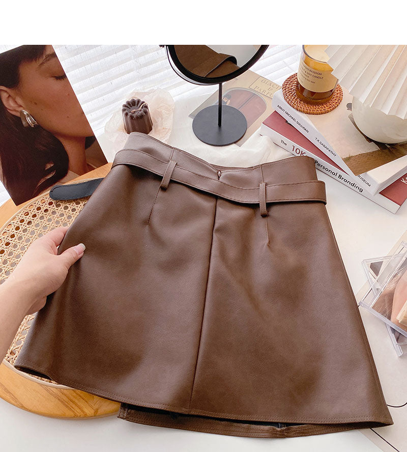Fashion irregular button high waist thin wrap hip leather skirt  5509