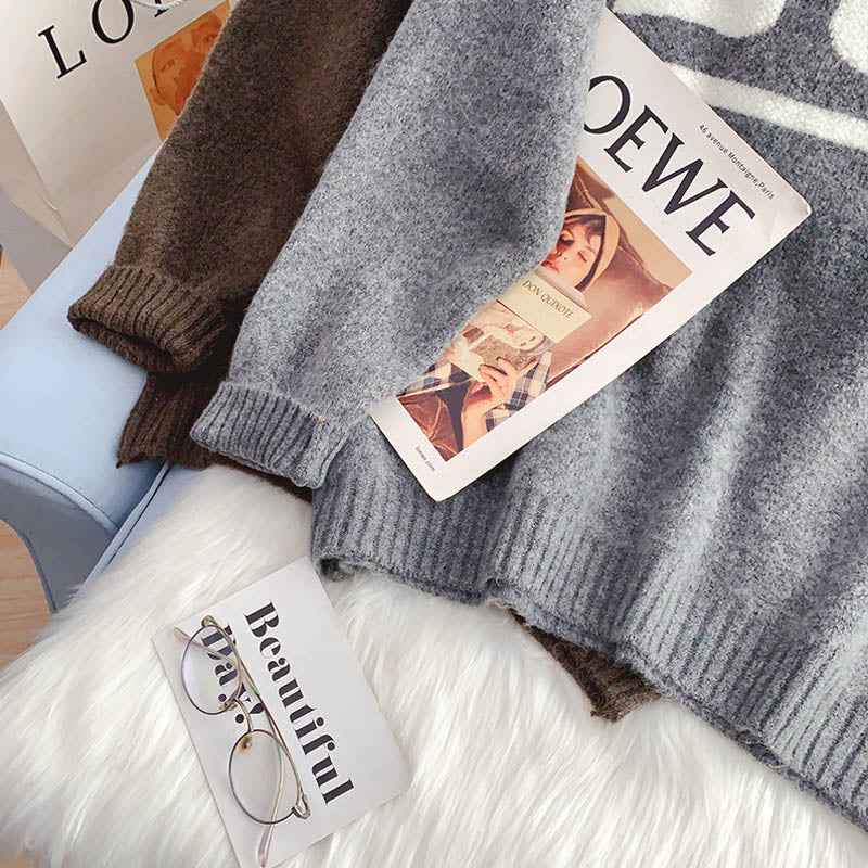 Lässiger Wind- und Fremdstil-Pullover mit gealtertem Saum 5155