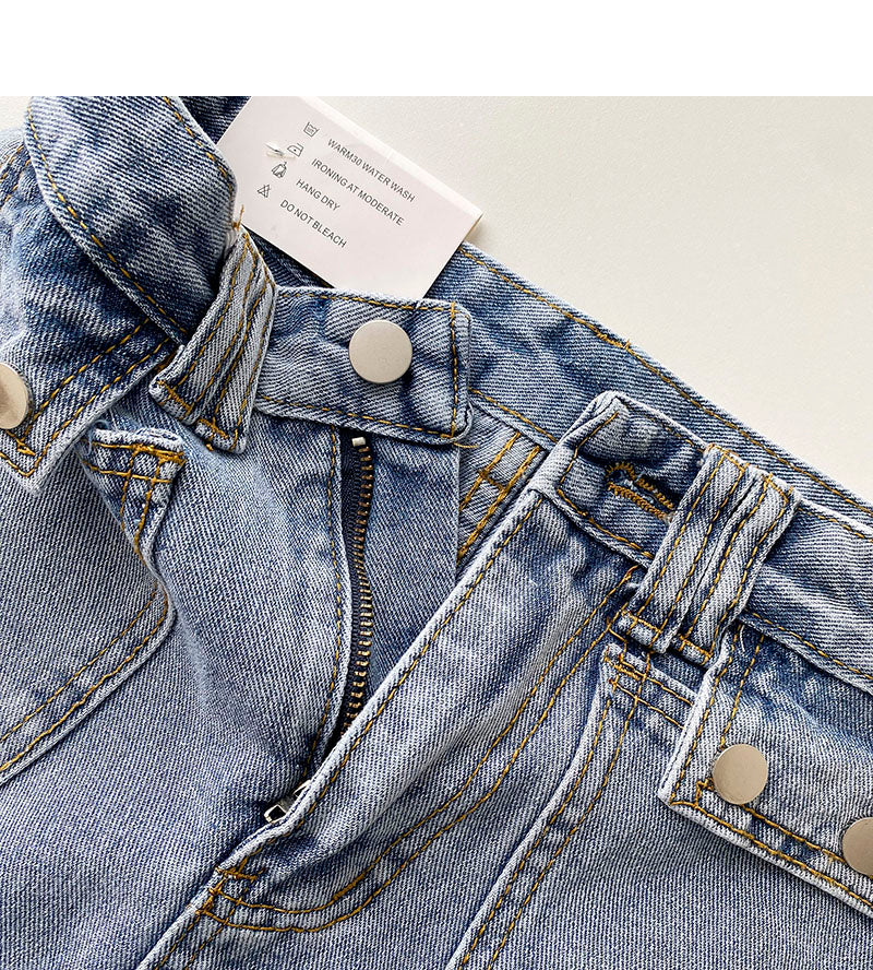 Das neue koreanische Design mit kleinen Taschen zeigt einen dünnen, hüftumwickelten Jeansrock 5331