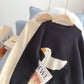 Pull brodé japonais à motif de canard 5099