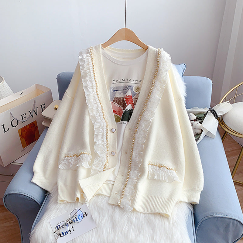 Loose design sense of minority sweet knitted coat  5060