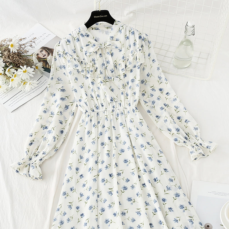 The new chiffon dress is soft and worn over the knee, showing a thin floral skirt  4819