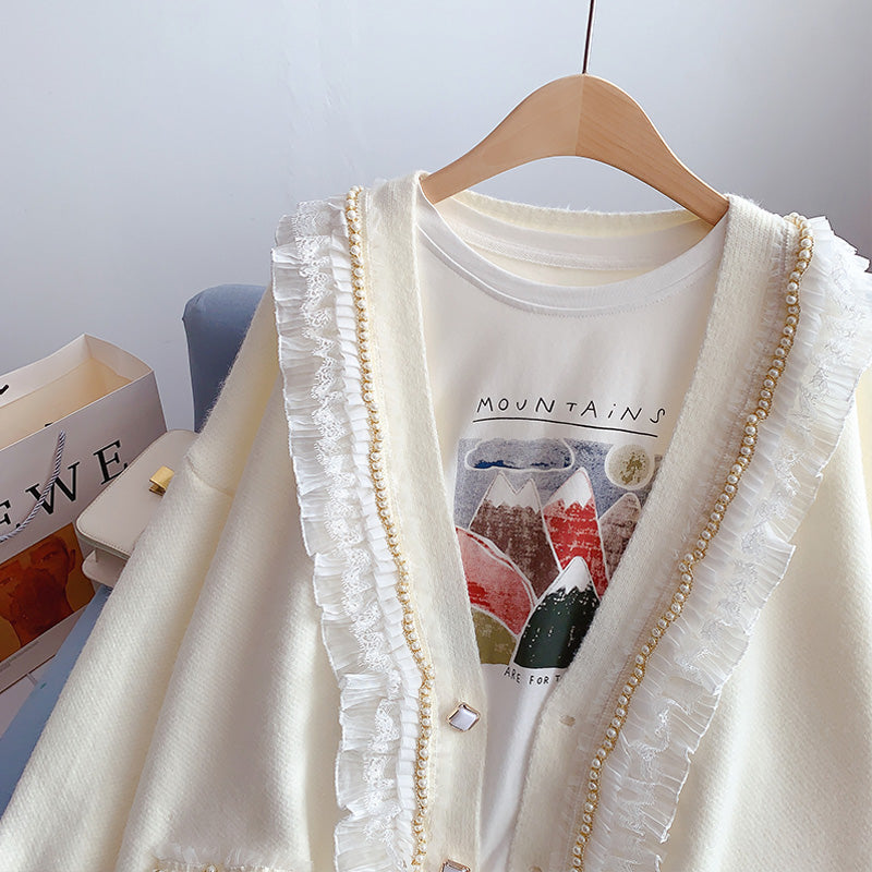 Loose design sense of minority sweet knitted coat  5060