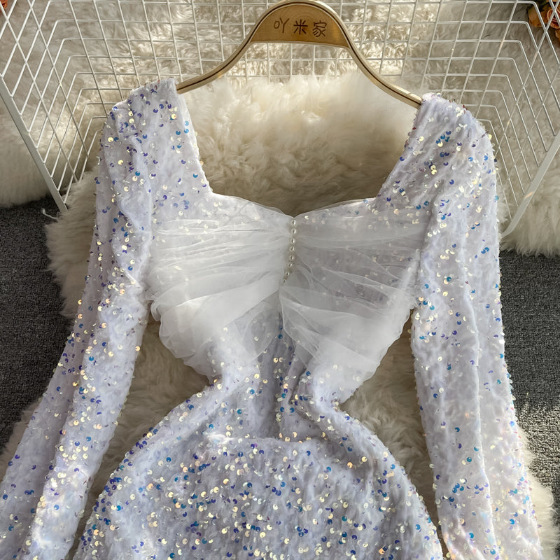 Fischschwanzkleid 3744 mit sexy Netznähten an der Hüfte in Wickeloptik