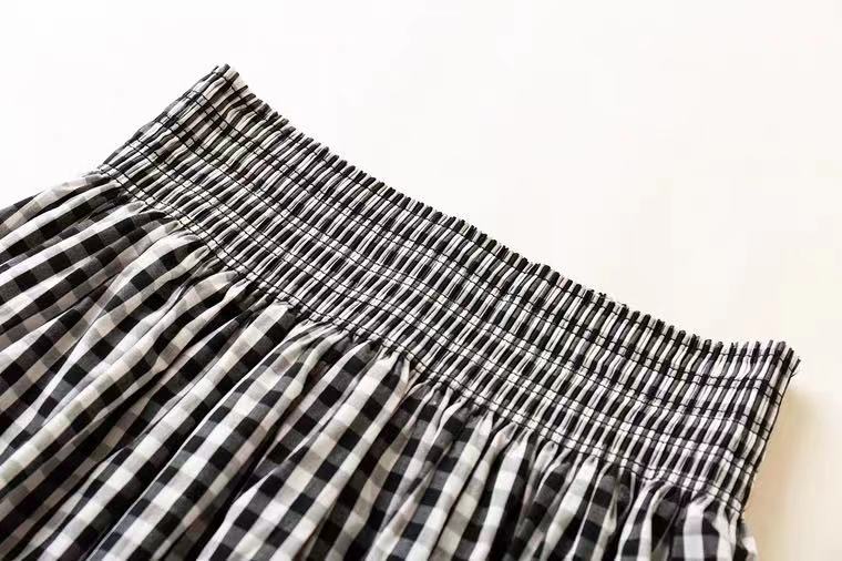 Mini jupe à carreaux noirs et blancs 3621