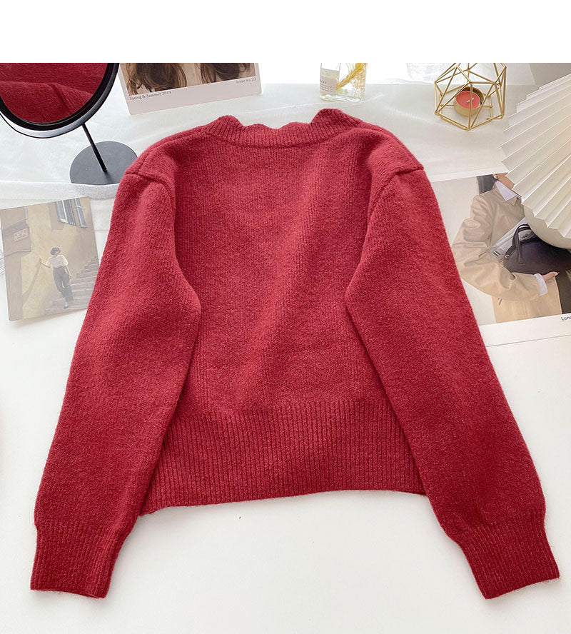 Korean solid color casual personalized single breasted long sleeved top  6042