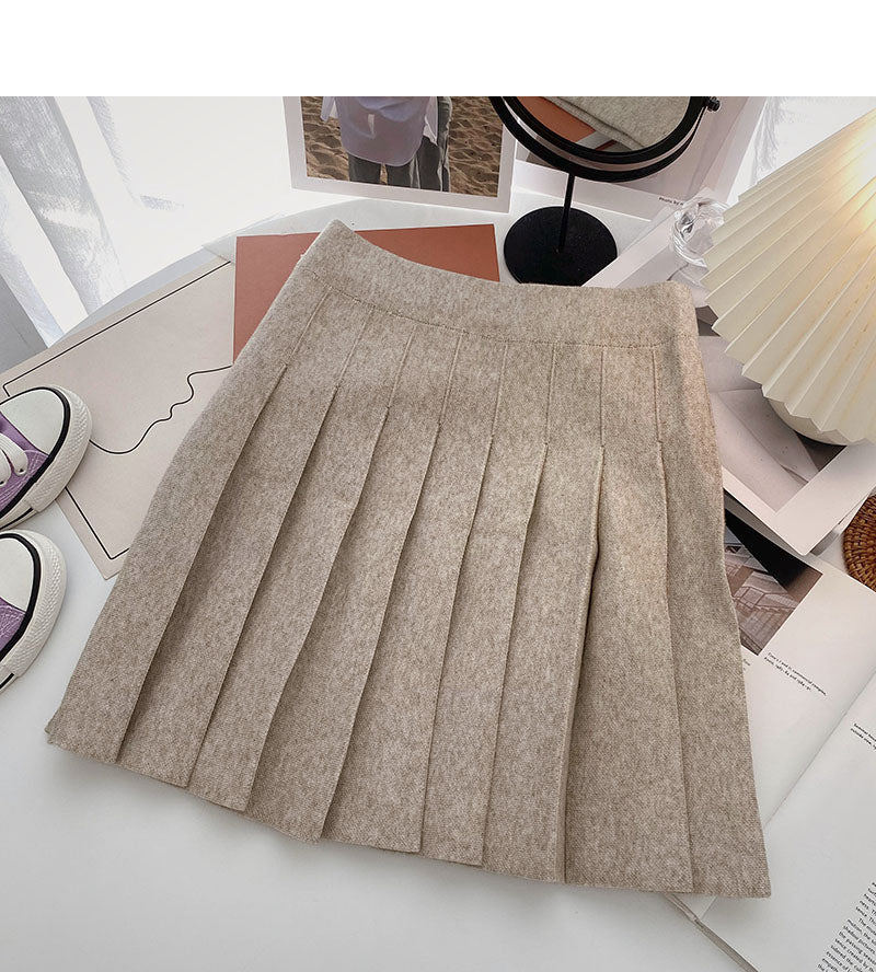 Korean version small man solid color versatile knitted A-shaped high waist skirt  5452