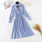 Sweet age reducing thin bow college snow spinning dress  3890