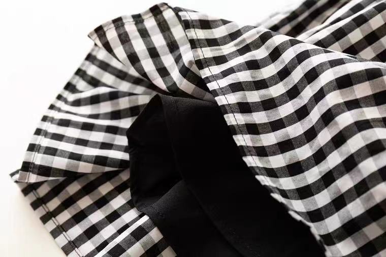 Mini jupe à carreaux noirs et blancs 3621