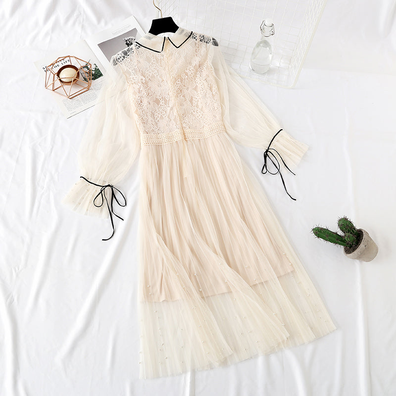 Robe en maille de dentelle à manches trompette avec perles à clous 4323