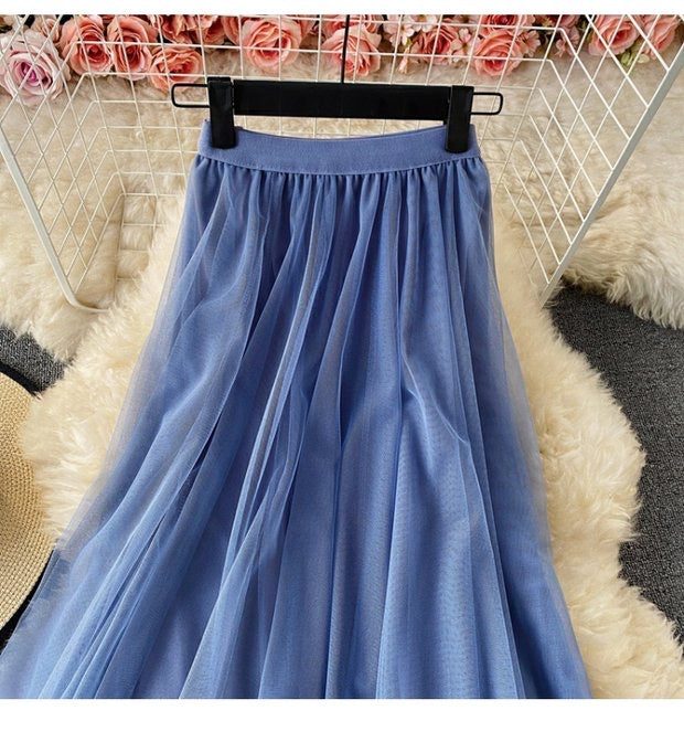 Elastic waist irregular mesh skirt, high waist medium long A-line skirt, fairy skirt shaggy skirt  3525