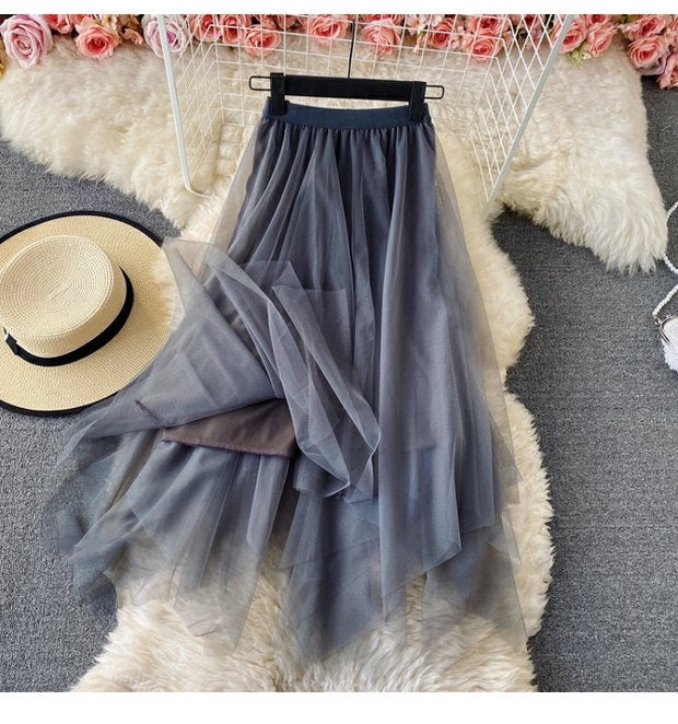 Elastic waist irregular mesh skirt, high waist medium long A-line skirt, fairy skirt shaggy skirt  3525