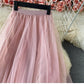 Elastic waist irregular mesh skirt, high waist medium long A-line skirt, fairy skirt shaggy skirt  3525